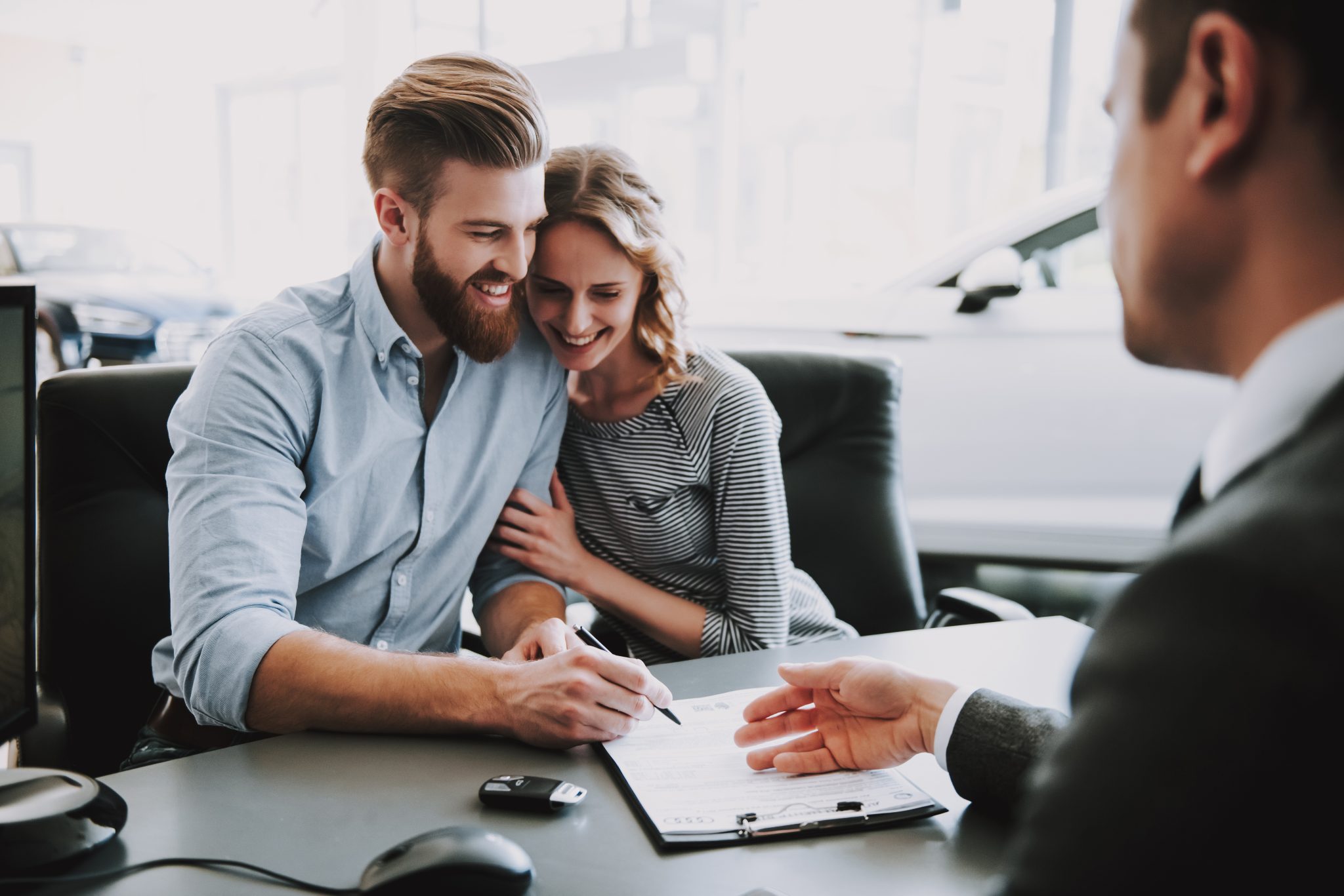 Portrait,Of,Successful,Young,Couple,Buying,Car.,Caucasian,Man,And